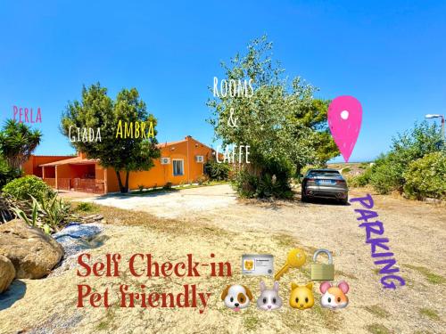 a sign that says self check in pet friendly at La Nuova Rinascita in San Giovanni Suergiu