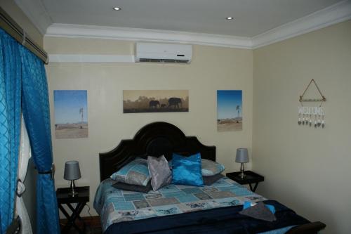Katil atau katil-katil dalam bilik di Jolani Guest House
