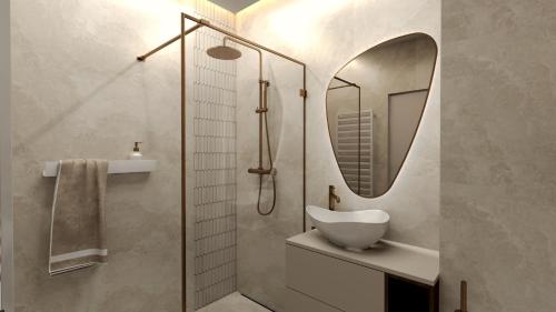 a bathroom with a sink and a mirror at Apartamenty Kościuszki Winda Klimatyzacja in Iława