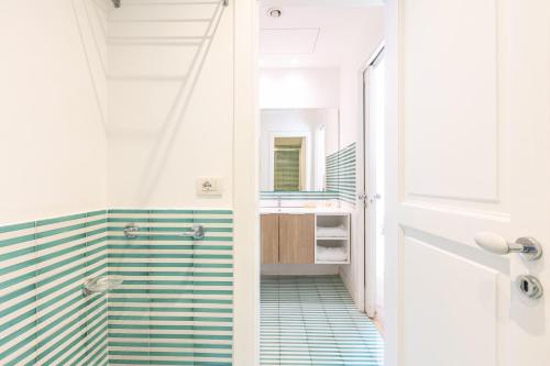 a bathroom with a shower and a sink at Maison Il Corso in Sorrento