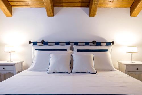 Postel nebo postele na pokoji v ubytování Starhost - CASA ADA seaview terrace