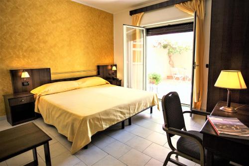 Postel nebo postele na pokoji v ubytování Hotel Marabel