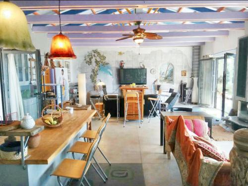 a living room with a couch and a table at Elegant Villa with Sea View in Politika in Politika
