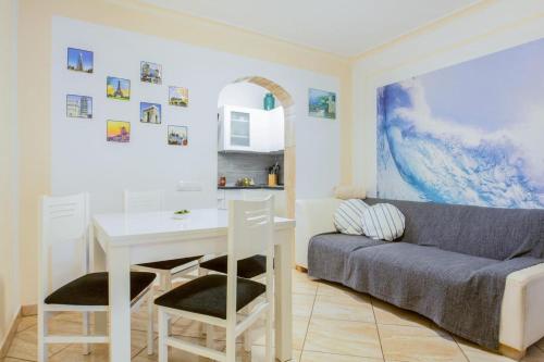 a living room with a table and a couch at Charming House in Costa Calma with Mountain View and Terrace in Costa Calma
