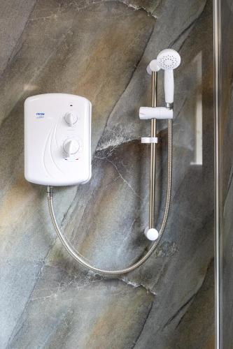 a shower in a bathroom with a shower at Spacious 2BR APT - Sleeps 5 - Private Parking in Highbridge