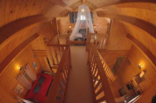 an overhead view of a car in a wooden cabin at Charming Bungalow in Tarifa with Mountain View in Tarifa