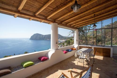 a balcony with a view of the ocean at House with garden and sea view in Lipari in Lipari