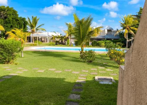 a view of the pool at the resort at Charming Studio in Grand Baie, 60 m² with Shared Pool in Grand-Baie
