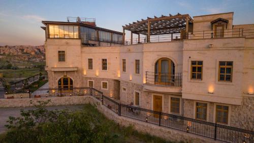 an image of a building with a balcony at Unique Cappadocia Palace in Göreme