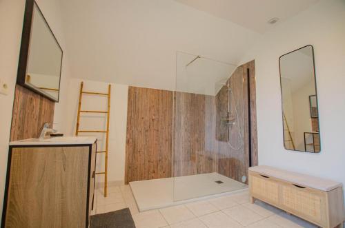 a bathroom with a shower and a sink at Chez annie in Onjon