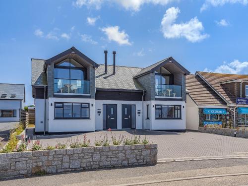 a large house on a street at Sea Skapya - Uk50178 in Helston