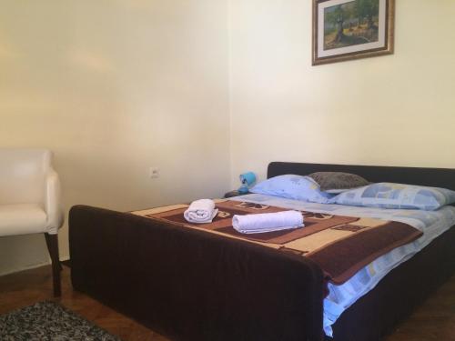 Кровать или кровати в номере Apartments OldTown