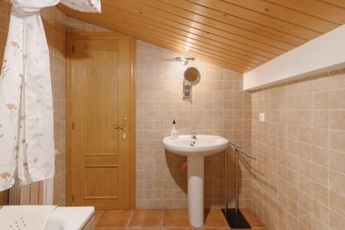 a bathroom with a sink and a toilet at Casa Montenegro Las Colladas in Las Colladas