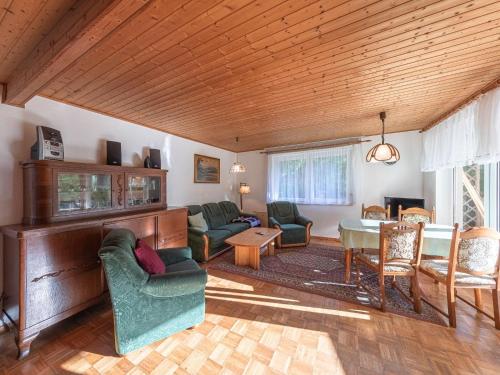 a living room with a couch and a table at Groot Huus in Lärz