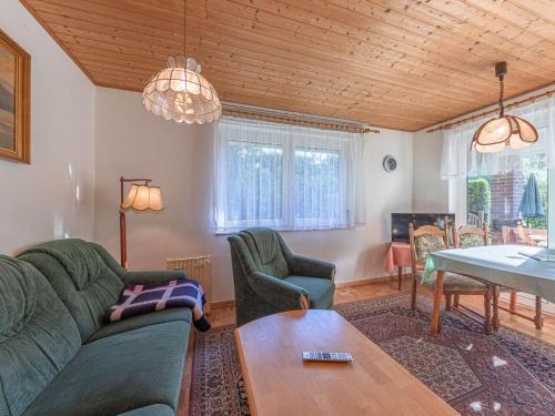 a living room with a couch and a table at Groot Huus in Lärz