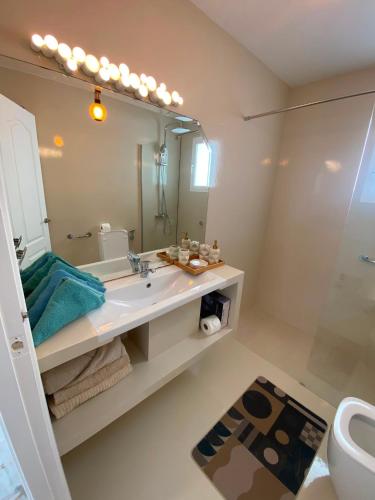 a bathroom with a sink and a mirror at Marbella Sunseat apartment in Marbella