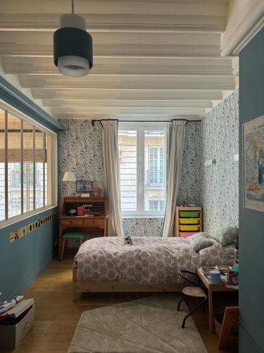 Élégant duplex familial avec terrasse Paris centre
