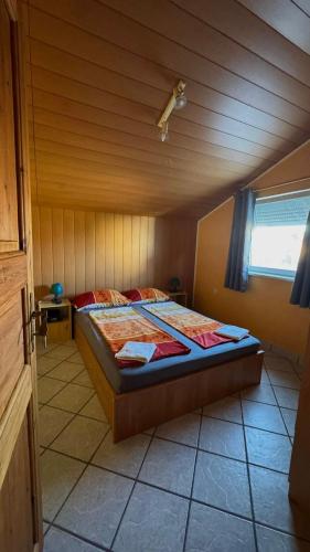 a bedroom with a bed in a room at Villa LIR in Vir