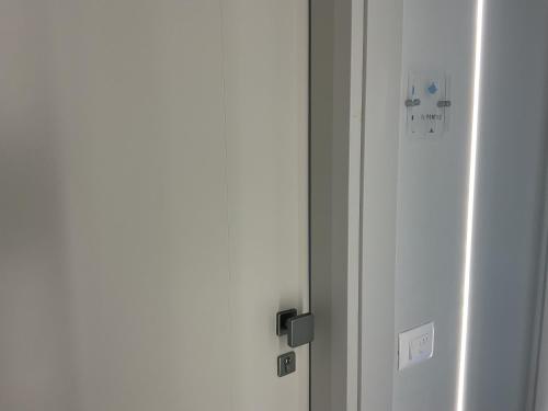 an open door to a room with an electrical socket at VILLA ACTEA in Vasto