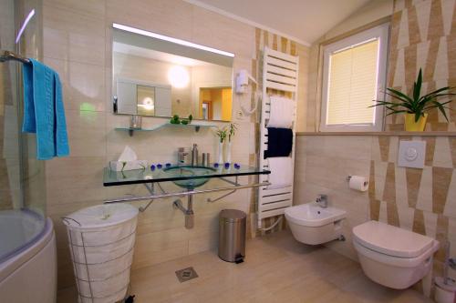 Ένα μπάνιο στο Apartment Allure