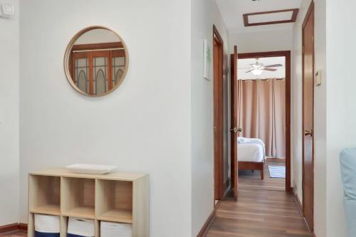a hallway with a mirror and a table at Amethyst Dunes by Pristine Properties Vacation Rentals in Indian Pass