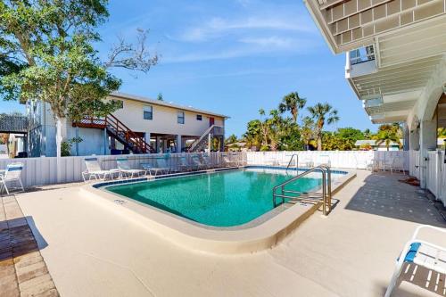 a swimming pool in the middle of a building at Fountain Head 5 in Holmes Beach