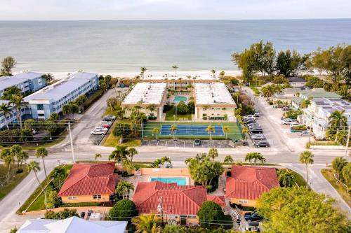 an aerial view of a resort with the beach at The Villas, Condo 1A in Holmes Beach