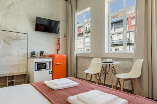 Largo das Flores Suites by Double Ninety Stays