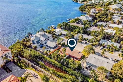 an aerial view of a resort next to the water at Holmes Beach Bungalow - B in Holmes Beach