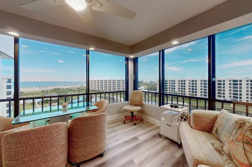 a living room with a view of the ocean at The Aquarium in Sarasota