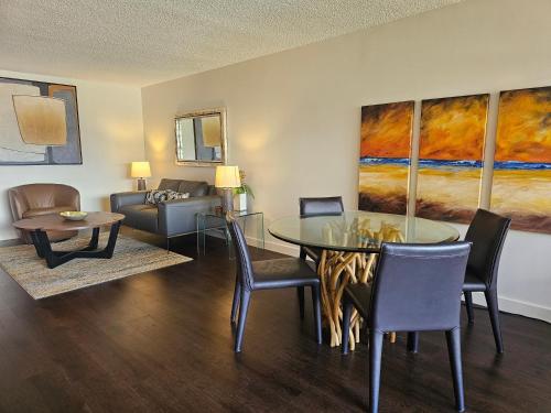 a living room with a table and a couch at Discovery Bay 3517 in Honolulu