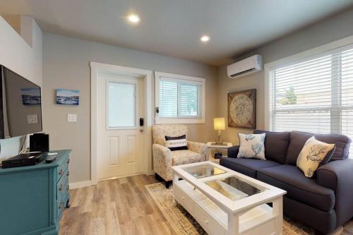 a living room with a couch and a table at South Bay Inn 3 in Anna Maria