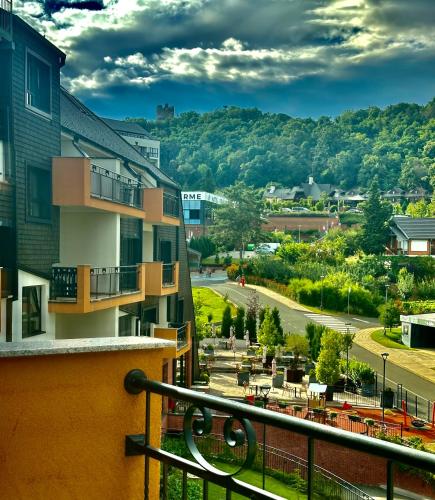 a view of a town from a balcony at Fruške 202 studio apartman in Vrdnik