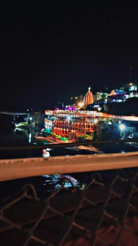 a view of a city at night with lights at Hotel sawariya in Godarpura
