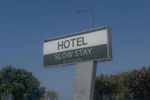 a street sign for a hotel slow stay at HOTEL SLOW STAY - Esposende in Esposende