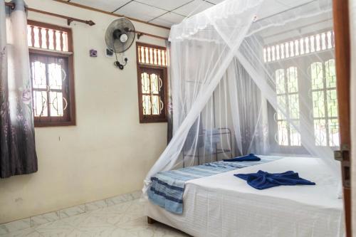 Postel nebo postele na pokoji v ubytování Dana Guest Home