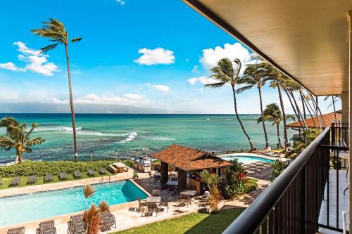 a view of the ocean from the balcony of a resort at Noelani 212 in Kahana