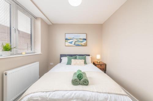 a bedroom with a bed and a window at 1 bed flat in Wolverhampton city centre in Wolverhampton