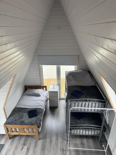 a room with two bunk beds in a attic at Han's Solo 75 in Athenry