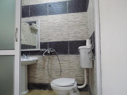Koupelna v ubytování Remmings Hotel Kampala