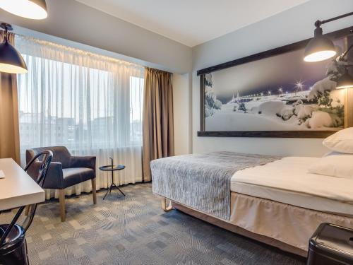 A bed or beds in a room at Original Sokos Hotel Vaakuna Vaasa