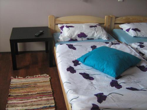 A bed or beds in a room at Viktória&Krisztián Apartments