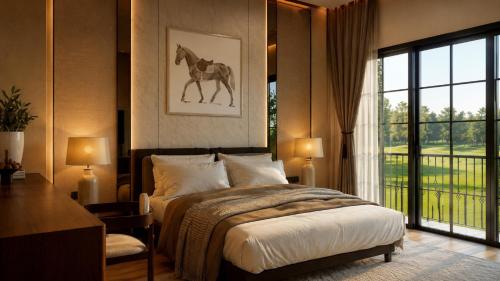 a bedroom with a bed with a horse picture on the wall at Hermes Haven Hotel in Pattaya South