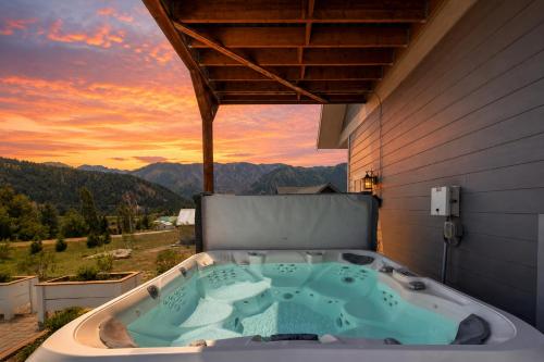 a bath tub sitting on the side of a house at Berg Haus Home in Leavenworth