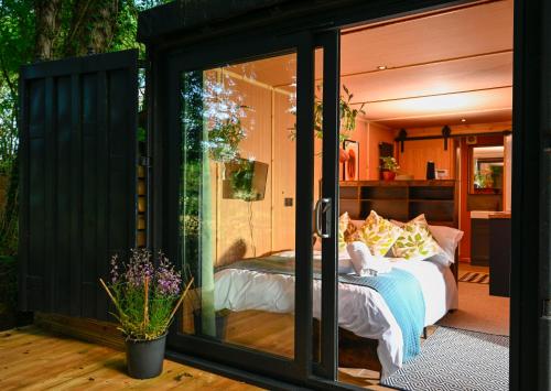 a room with a bed inside of a house at Bird Box in Carlisle