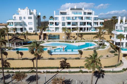 an aerial view of a resort with a swimming pool at Santa Barbara Residences by IDILIQ in Fuengirola