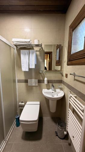 a bathroom with a toilet and a sink at Rum Evi By Secret Sense Collection in Safranbolu