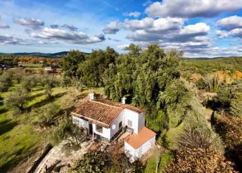 an aerial view of a white house in a field at Casa Papiqui in Fuenteheridos