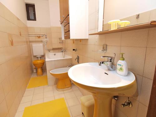 Kúpeľňa v ubytovaní Apartment Damir 864