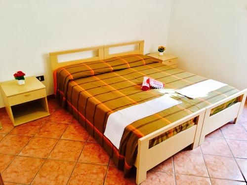 Кровать или кровати в номере Lorenzo Holiday homes